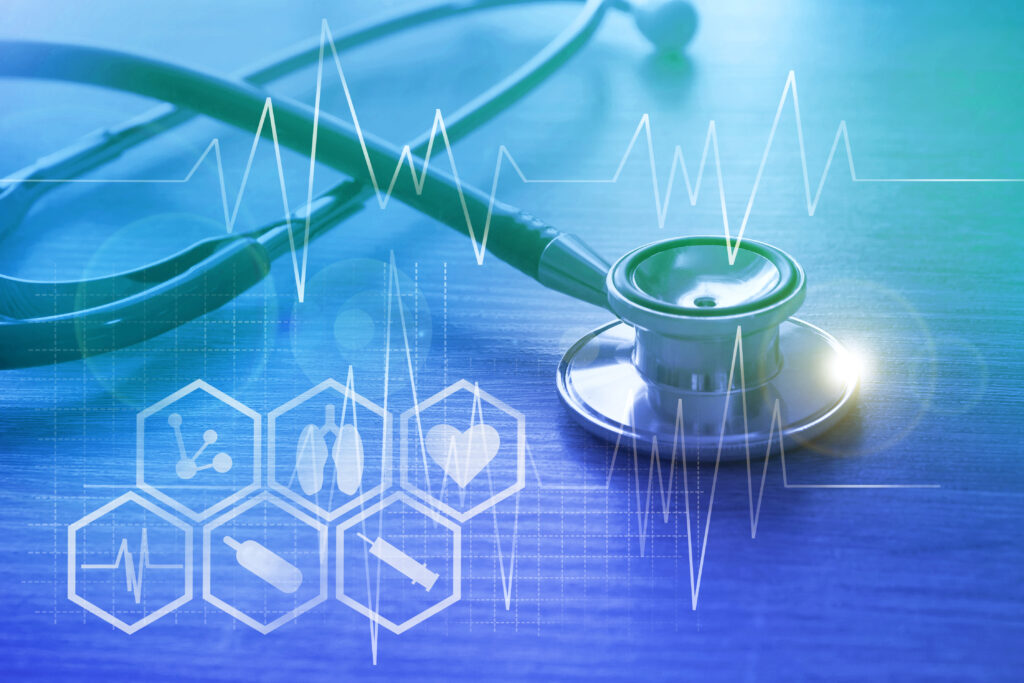 Stethoscope on a wooden surface with overlaid medical icons and heartbeat graph, representing digital healthcare technology, patient monitoring, and modern medical diagnostics and changes to HIPAA security rule